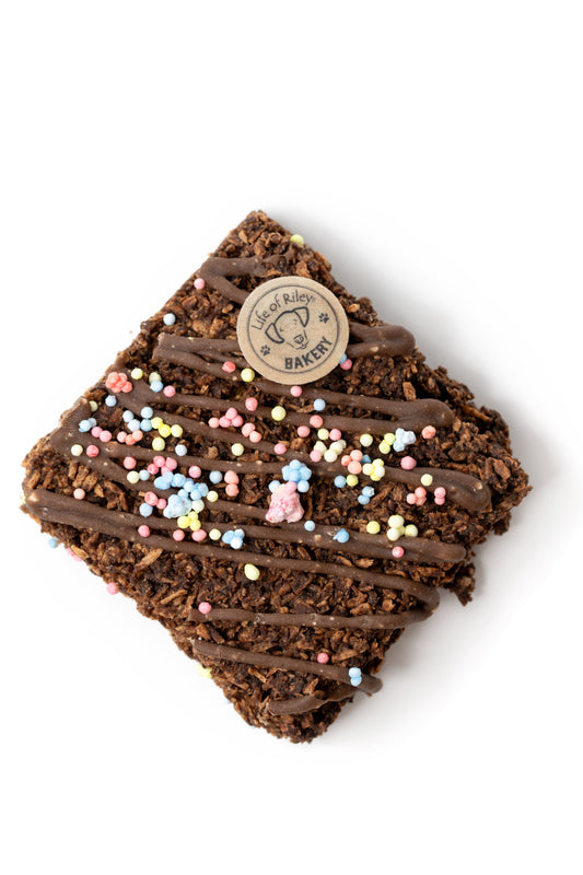 Doggy Brownies — deluxe carob and peanut butter brownie with coconut, natural sprinkles and Life of Riley Bakery stamp