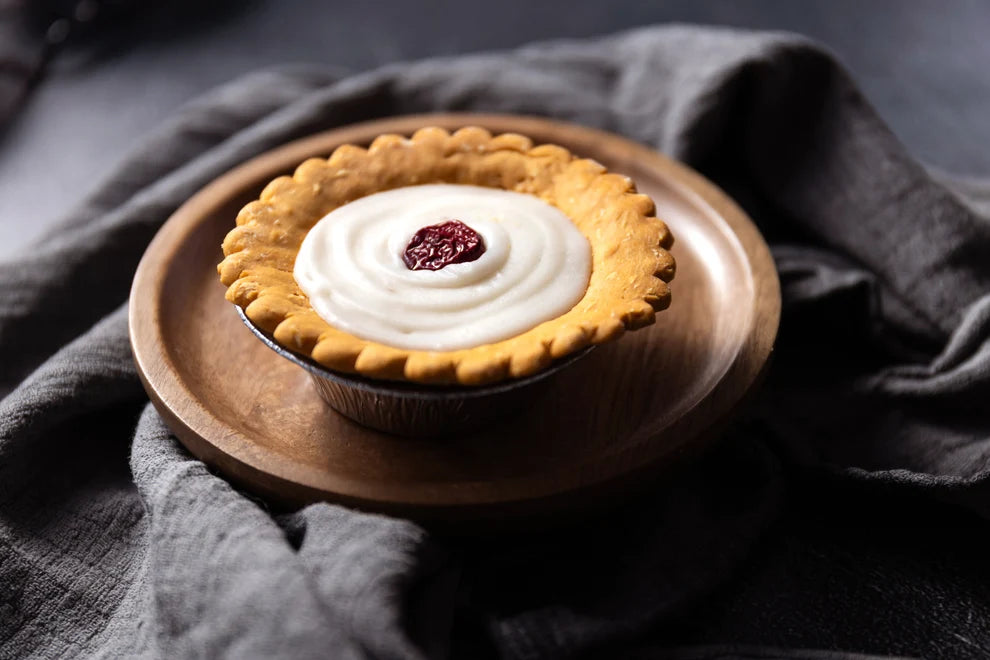 Life of Riley Bakery Bakewell Tart grain-free dog treat — handmade peanut butter base with sugar-free icing and cranberry